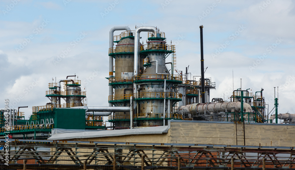 View of oil and gas refinery plant in Yaroslavl region. Petrochemical and chemical distillation process constructions and production communications.  Gasoline, petroleum, petrol production