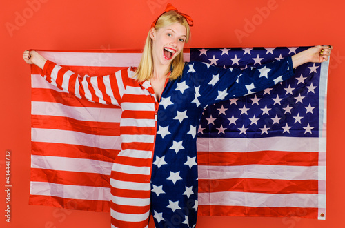 Fashion girl with american flag. Independence day celebration. 4th July. Patriotic costume. National colors USA.