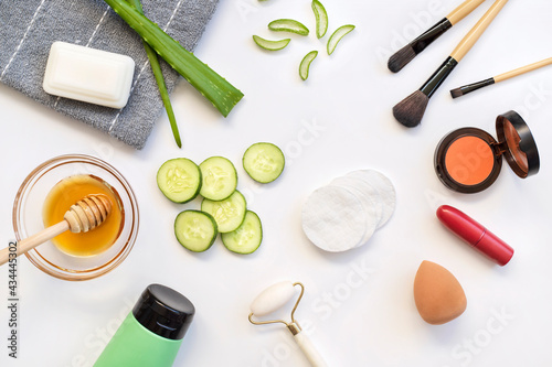 Aloe vera, Cucumber, Honey, Various Make up and Beauty Products on white background.