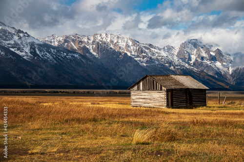 historic Moulton barns n Mormons' Row against the dramatic Teton mountain range  in Wyoming.