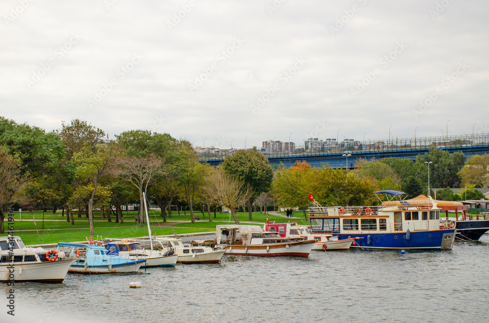Waterfront with boats and beautiful landscape overlooking the city
