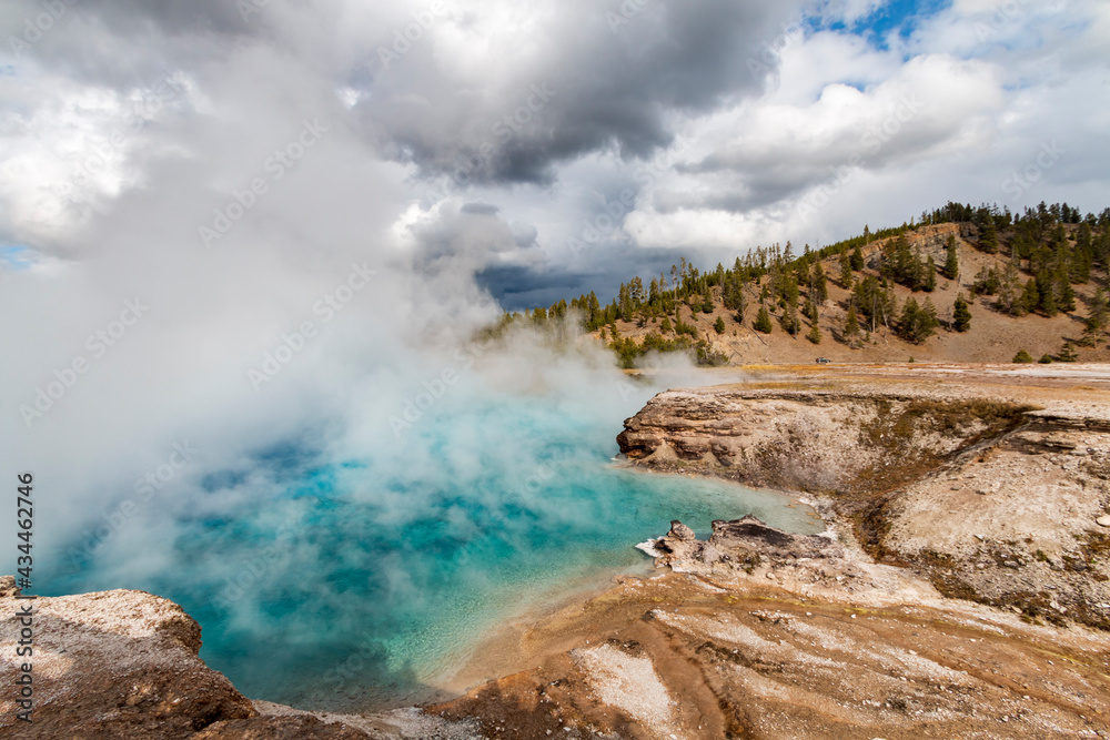 steaming hot springs and pools in the Lower Geyser Basin in Yellowstone National Park in Wyoming.