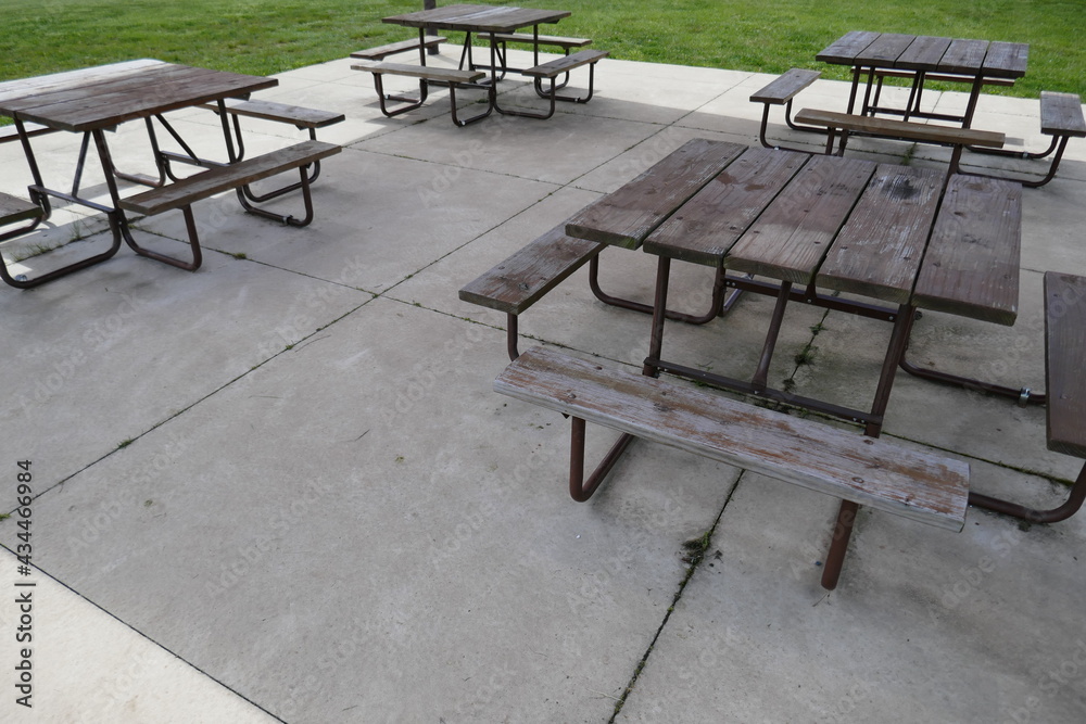 Square picnic tables in outdoor shelter house Square picnic tables in outdoor shelter house