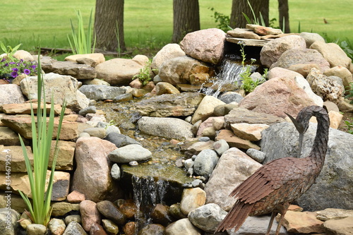 Backyard water feature offers a relaxed lifestyle.