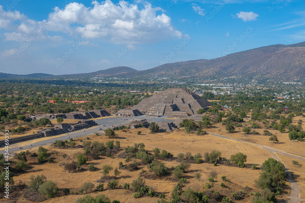 Naklejka premium Aerial view of Pyramid of the Moon from the top of Sun Pyramid in Teotihuacan in city of San Juan Teotihuacan, State of Mexico, Mexico. Teotihuacan is a UNESCO World Heritage Site since 1987. 