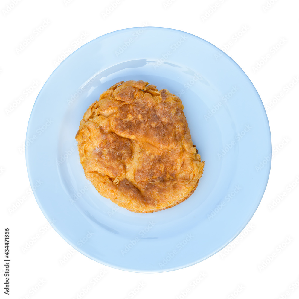 Closeup of a simple egg omelet and plate isolated on white background Closeup of a simple egg omelet and plate isolated on white background