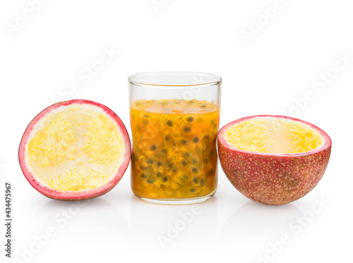 Passion fruit with fresh juice isolated on white background close-up