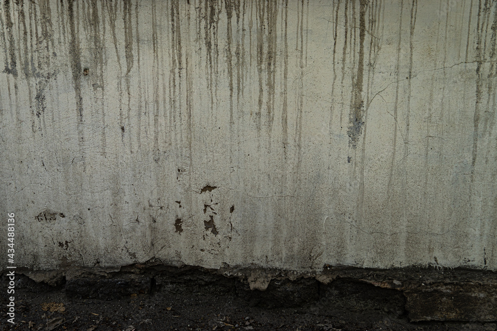 Obraz premium The texture of a stone wall, flooring, concrete destruction, metal corrosion and rusty antiquity, the basis of construction reinforcement and ceilings, paint chips