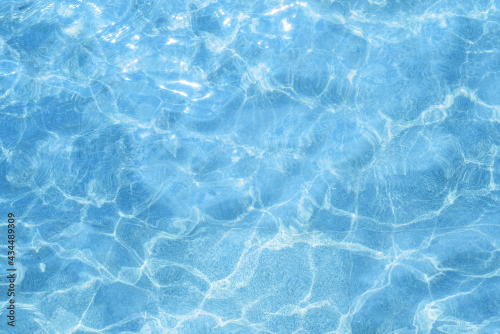 Blue Light Pool Water Outside Water Texture On A Sunny Day Top View Ripples And Glare On The