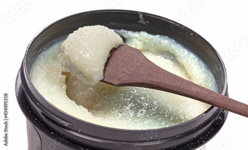 Special bath salt with wooden spoon, isolated