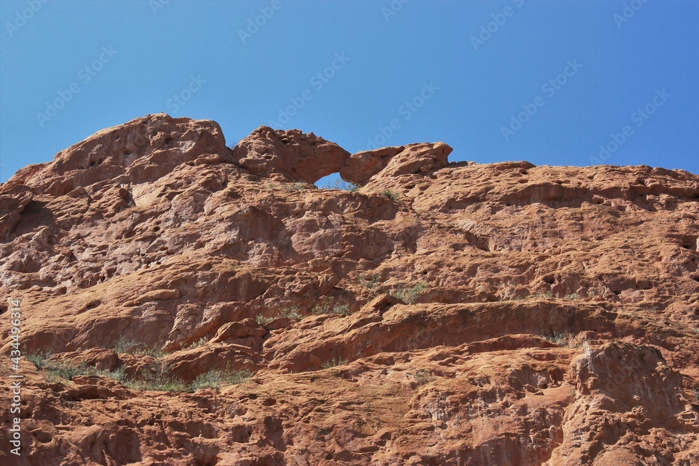 Garden of the Gods Kissing Camels with blue sky that's bright and colorful on a summer day by Colorado Springs Colorado.