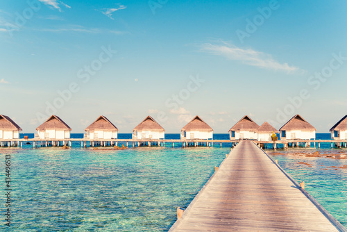 Beautiful tropical Maldives resort hotel and island with beach and sea © topntp