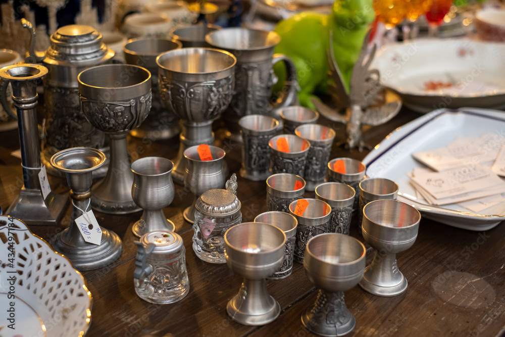 Fototapeta premium Collection of silver goblets at local market