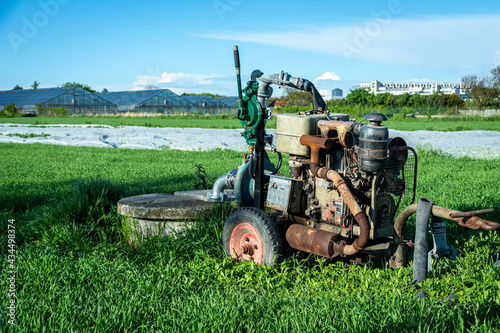 Bilde på lerret agricultural irrigation system with an old rusty diesel water pump