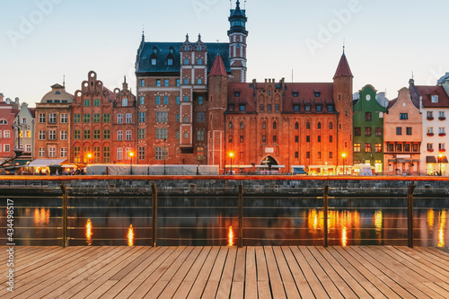 Facades of old medieval houses on the promenade in Gdansk city