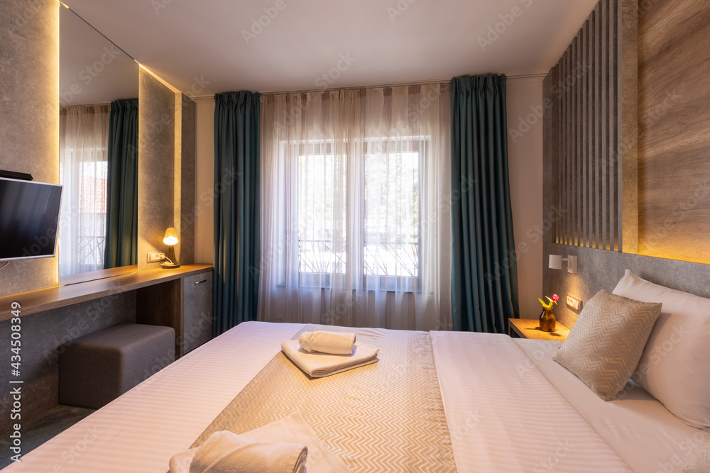 Fototapeta premium Interior of a hotel bedroom in luxury hotel