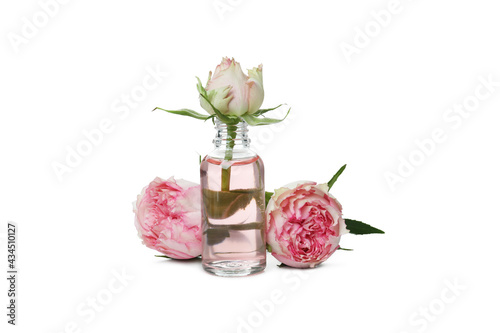 Rose essential oil isolated on white background