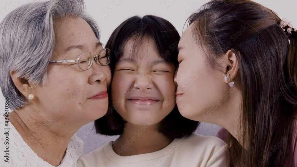 Happy asian family giving each other a cuddle full of love and affection. Happy asian family giving each other a cuddle full of love and affection.