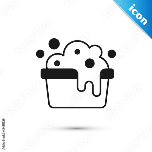 Grey Plastic basin with soap suds icon isolated on white background. Bowl with water. Washing clothes, cleaning equipment. Vector