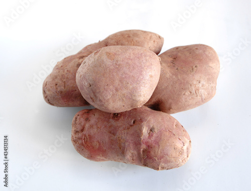 Colfiorito red potato is a typical product of the Foligno area on the Colfiorito plateau isolated on white background photo