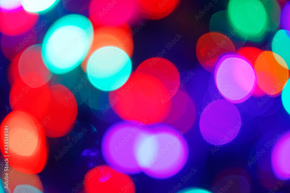 Multicolor Bokeh in a blue natural background, defocused Multicolor Bokeh in a blue natural background, defocused