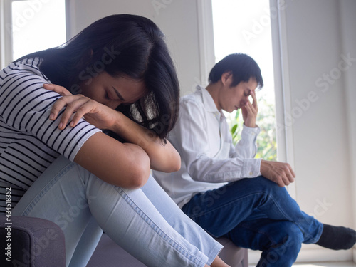 Fotografie Asian women are disappointed and saddened after an argument with their husband