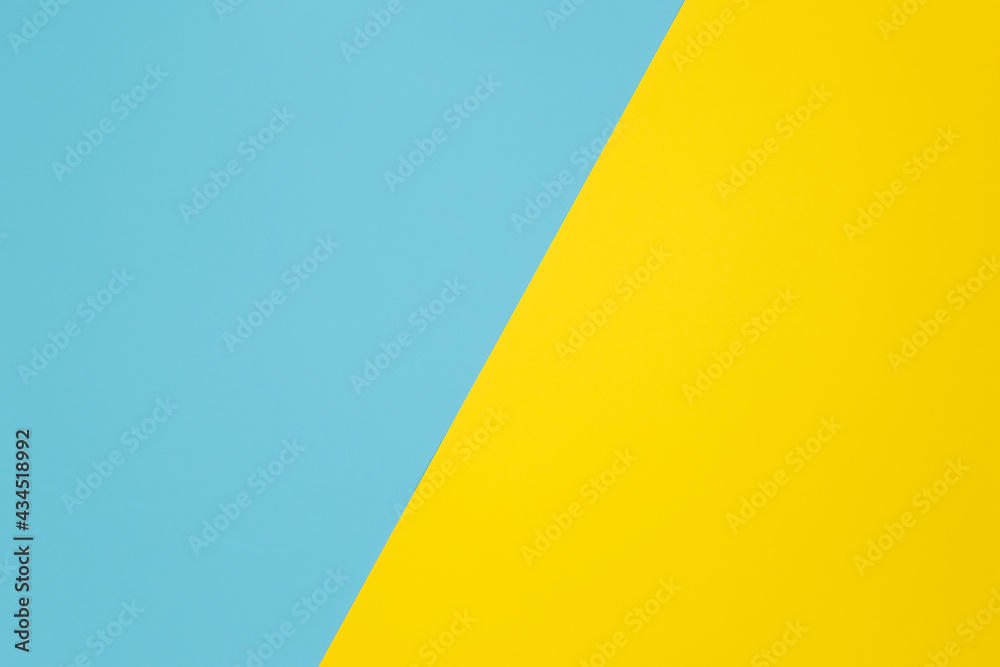 Two-color background made with diagonal line. Yellow and light blue colorway. Two-color background made with diagonal line. Yellow and light blue colorway.