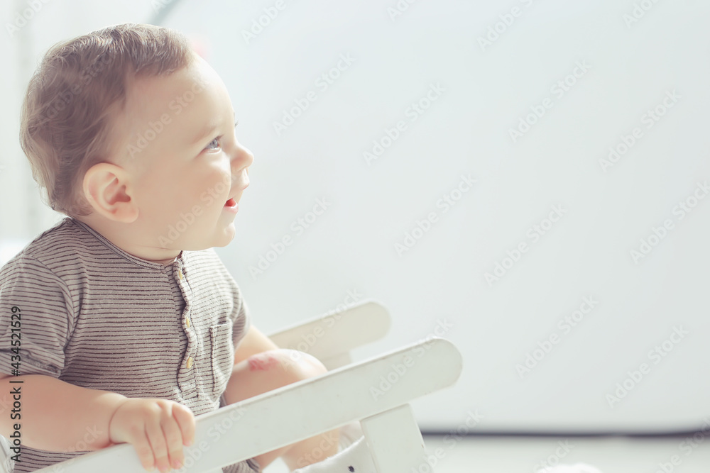 toddler child in a bright studio / little boy infant beautiful healthy child toddler child in a bright studio / little boy infant beautiful healthy child