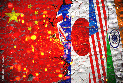 Grunge china vs australia, japan,us,and india national flags icon pattern isolated on broken cracked wall background, abstract international political relationship divided conflicts.quad vs china. photo