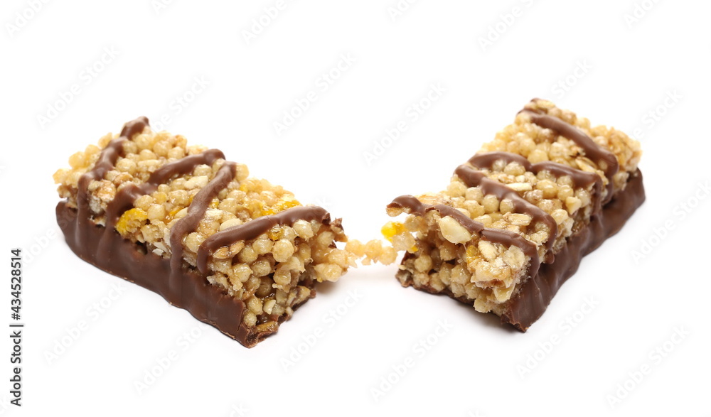 Chocolate covered granola bar broken in half, muesli snack isolated on white background