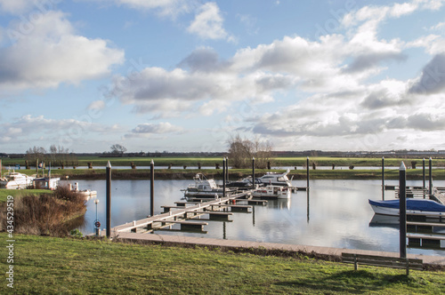 marina with motorboats and yachts on a winter's day © henkbouwers