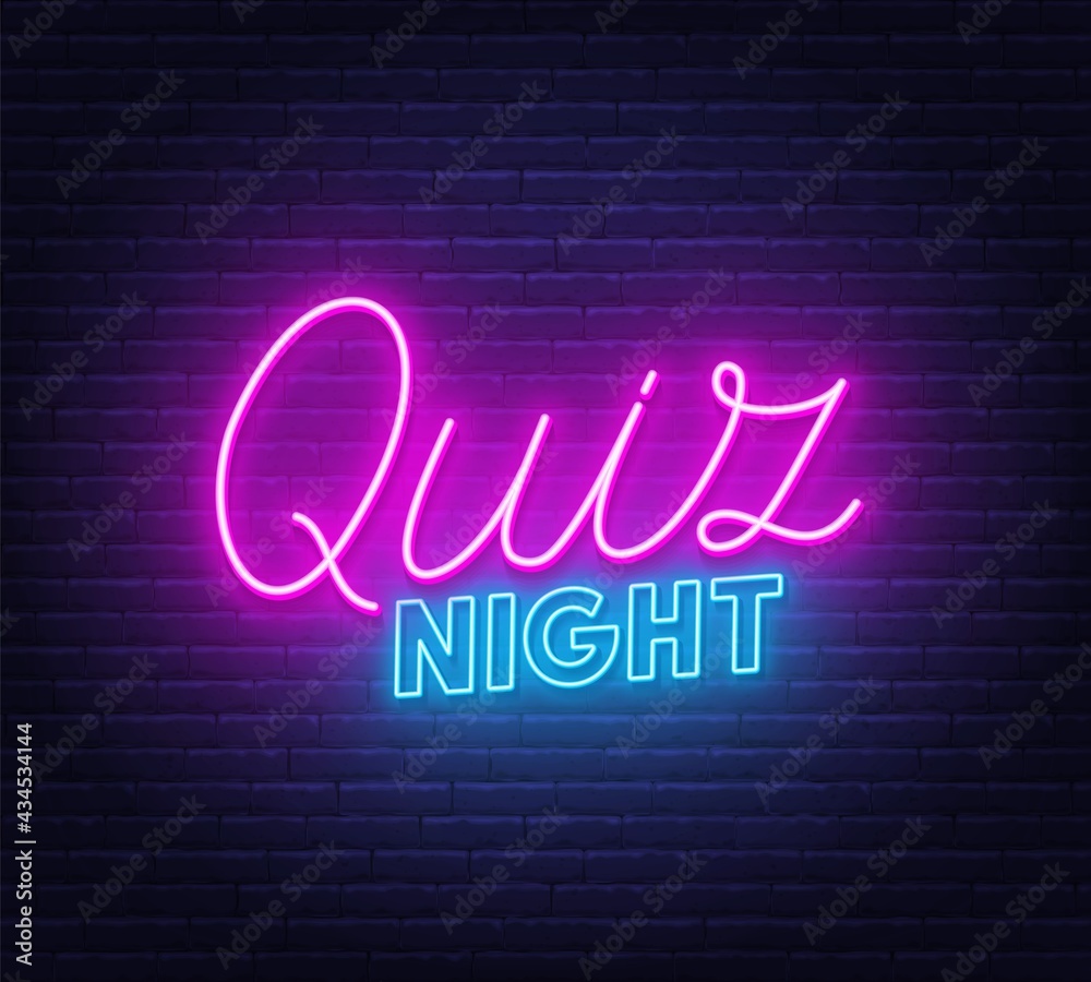 Quiz Night neon sign on brick wall background.