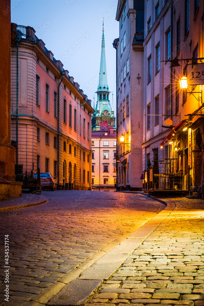 Fototapeta premium Deserted cobbled streets of Gamla Stan, Stockholm, Sweden at dusk