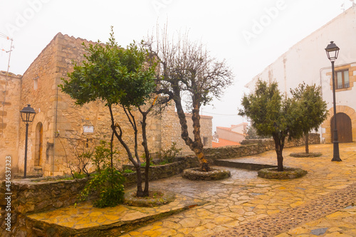 Chodos (Xodos), Castellon province, Valencian Community, Spain. Historic village. Beautiful medieval town on the Penyagolosa mountain in the Alcalatén area. Cloudy day. photo