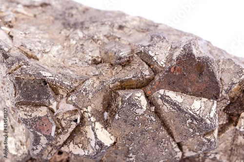 Macro mineral stone Pyrite gold on white background