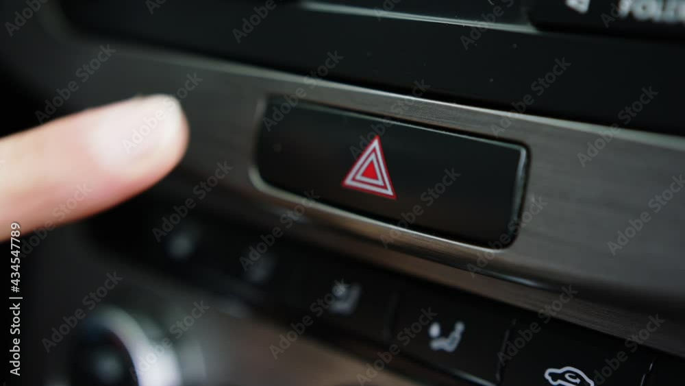 Vehicle Stopped On Road And male Driver Pushing Car Hazard Emergency