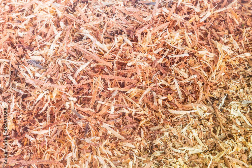 Sawdust brown from cutting wood by a carpenter. Sawdust brown from cutting wood by a carpenter.