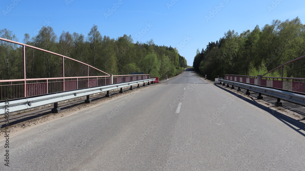 bridge road with traffic symbols in Belarus