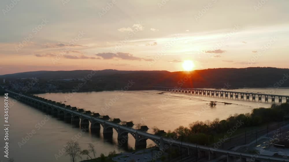 Heavens at sunset. Afterlife and death theme. Peaceful nature of river and bridges at sunrise. Heavens at sunset. Afterlife and death theme. Peaceful nature of river and bridges at sunrise.