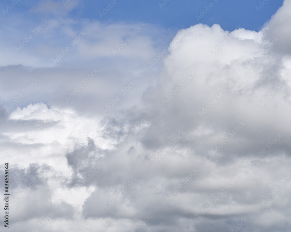 clouds float across the blue sky clouds float across the blue sky