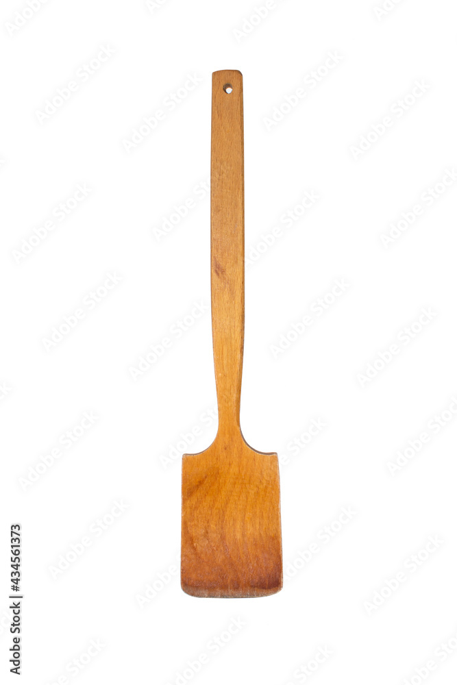 Wooden cooking spatula for cooking on a white background.Kitchen spatula made of wood top view. Wooden cooking spatula for cooking on a white background.Kitchen spatula made of wood top view.