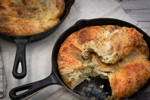 Cheese stuffed pastry baked in cast iron skillet