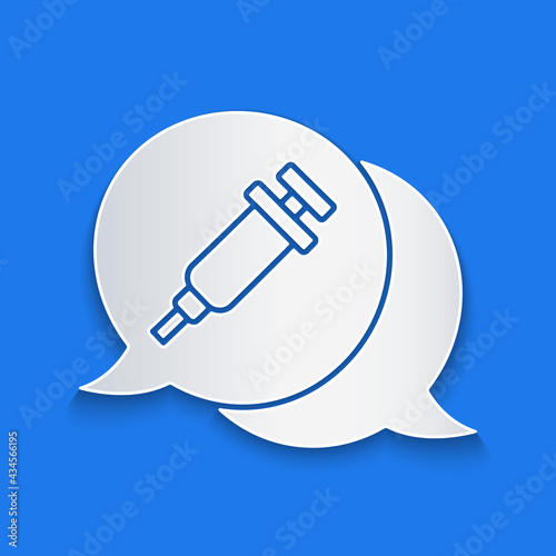 Paper cut Addiction to the drug icon isolated on blue background. Heroin, narcotic, addiction, illegal. Sick junkie with a syringe and medical pills. Paper art style. Vector