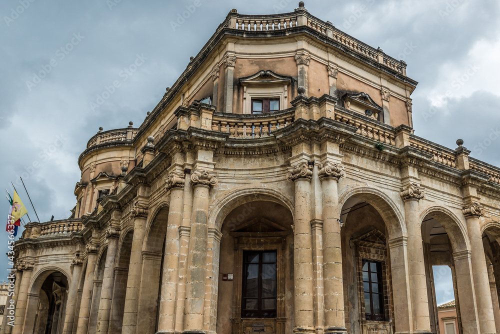 Side view of Palazzo Ducezio building in center of historic part of Noto city, Sicily in Italy