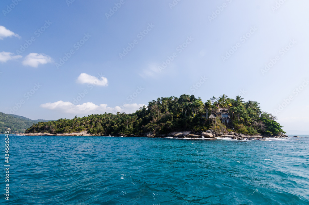 Coastline scenic view with blue sky and sea. Summer vacation day at Paraty's sea. Coastline scenic view with blue sky and sea. Summer vacation day at Paraty's sea.