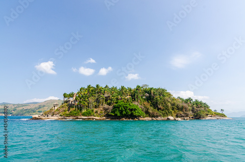 Coastline scenic view with blue sky and sea. Summer vacation day at Paraty s sea.