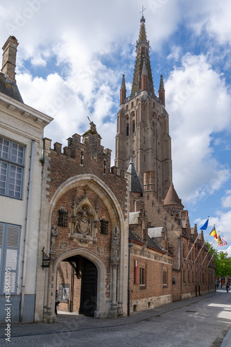 view of the Our Lady of Bruges church in the historic city center of Bruges