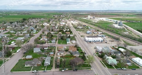 The historic town of Wheatland Wyoming in 2021 springtime green grass after snow melt and rains. photo
