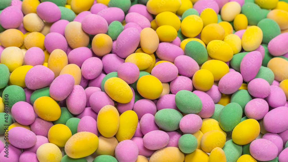 Group of colorful peanuts in glaze.