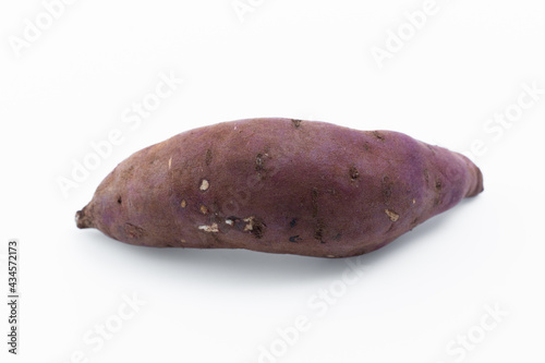 Japanese burned potatoes on white background